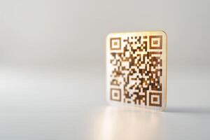 Close-up of a wooden QR code against a light background, symbolizing technology and connectivity. photo