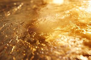 Close-up of a shimmering golden surface with textured patterns and light reflections. photo