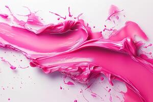 A vibrant splash of pink paint, showcasing smooth texture and dynamic flow against a clean white background. photo