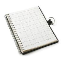 A blank spiral-bound notebook with graph paper setting, ideal for sketching or note-taking. photo