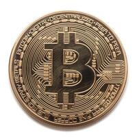 A detailed close-up of a Bitcoin gold coin, showcasing its intricate design and digital currency representation. photo