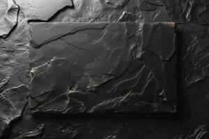 Textured slate background featuring a dark, rugged surface with intricate lines and patterns. photo