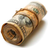 A close-up view of a rolled stack of US currency, showcasing hundred-dollar bills, representing wealth and financial success. photo