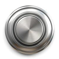 Close-up of a shiny, metallic round plate showcasing a series of elegant concentric circles. photo