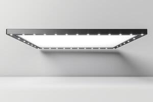 Sleek modern LED ceiling panel light illuminating a minimalist space. photo
