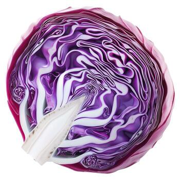 A close-up of a vibrant red cabbage sliced to reveal intricate patterns and textures. photo