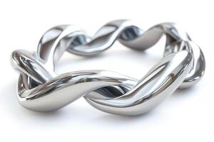A beautiful twisted silver ring showcasing intricate design and sheen. photo