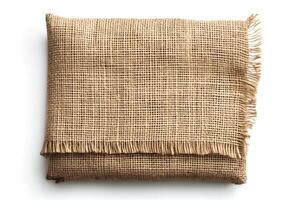 A neatly folded jute burlap fabric showcasing its natural texture and earthy tones. photo