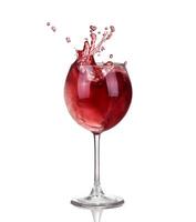 Wine collection - Splashing red wine in a glass. Isolated on white background, waves and splash photo
