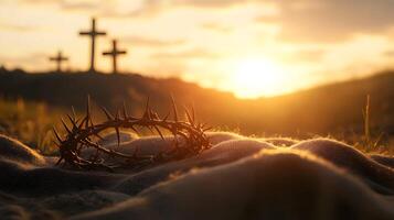 Crown of Thorns and Three Crosses on Calvary Hill at Sunset Symbolizing Christian Faith photo