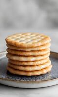 Stack of Crispy Rice Crackers on a Plate - Delicious Snack Ready to be Served and Enjoyed photo