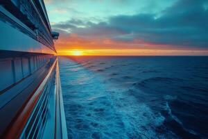 Cruise ship sailing on the ocean at sunset creating a beautiful wake photo
