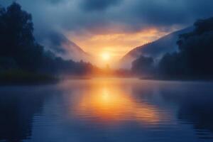 Foggy sunrise creating golden reflections on lake surface photo
