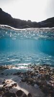 Underwater view of the sea with rocks and pebbles photo