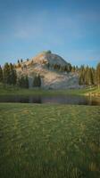 A mountain with a lake and trees in the background photo