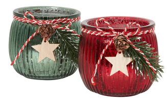 party candle glass Red Christmas leaves with stars cut out isolated white background with clipping path photo