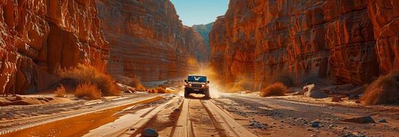A truck driving through a canyon with a sun shining through photo
