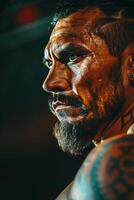 A man with tattoos and a beard photo