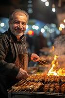 A man cooking on a grill photo