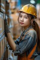 Asian female worker in warehouse photo