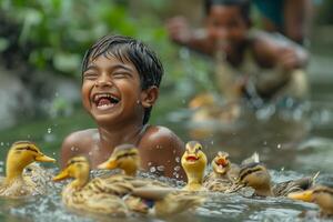 A boy smiles while swimming with ducks in the water photo