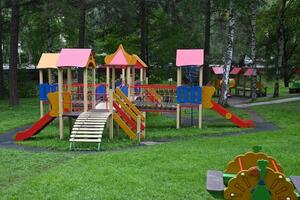 An image of a colorful playground, without children On a sunny, beautiful day. photo