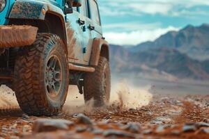 A jeep driving on a dirt road photo