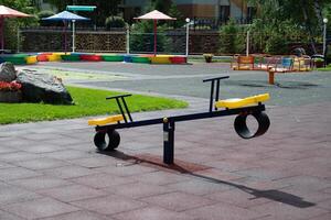 An image of a colorful playground, without children On a sunny, beautiful day photo