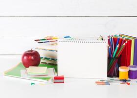 Drawing supplies on white table close up photo