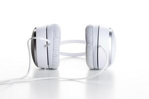 White headphones on white background close up photo