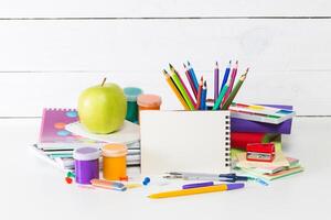 Drawing supplies on white table close up photo