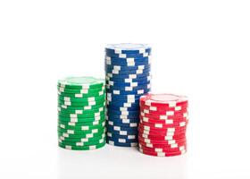 Stack of poker chips isolated on white background photo