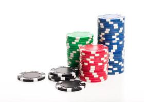 Stack of poker chips isolated on white background photo