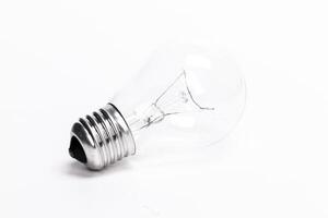 Close up of a light bulb on white background photo