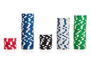 Stack of poker chips isolated on white background photo
