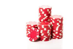 Stack of poker chips isolated on white background photo