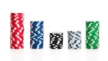 Stack of poker chips isolated on white background photo