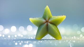 Star-shaped fruit glistens with droplets in soft lighting highlighting its unique form and texture photo