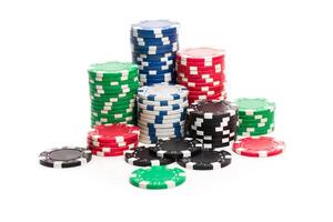 Stack of poker chips isolated on white background photo
