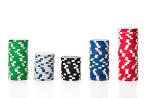 Stack of poker chips isolated on white background photo