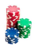 Stack of poker chips isolated on white background photo
