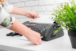 Fax machine close up in an office photo