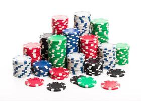 Stack of poker chips isolated on white background photo