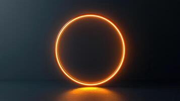 An orange neon circle on a dark background photo