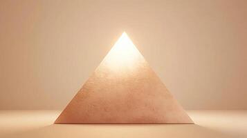 A triangle shaped object with a light shining from it photo