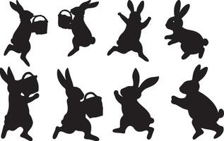 Silhouettes of rabbits jumping and carrying baskets vector