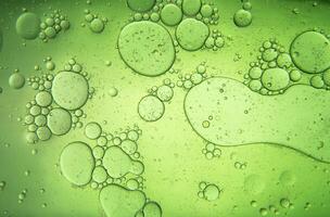 Abstract green composition with water and oil drops photo