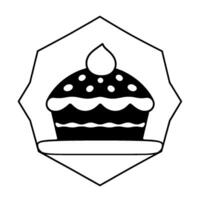 Black and white illustrative cupcake emblem, featuring frosting, polka dots, and a teardropshaped topping, within a decorative polygonal frame. vector