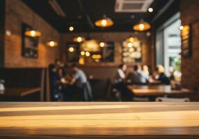 A table in a restaurant with people sitting at tables photo