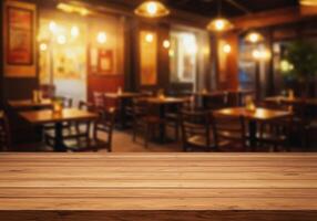 Wooden table top over restaurant interior with blurred lights photo